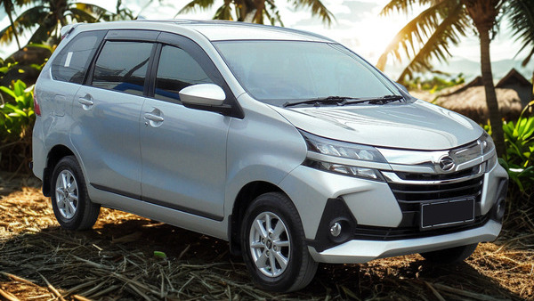 Daihatsu Xenia car rental in Sumba with palm trees and tropical beach.
