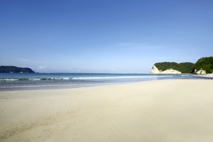 Tarimbang Beach Sumba wide sandy bay with turquoise water and surf waves