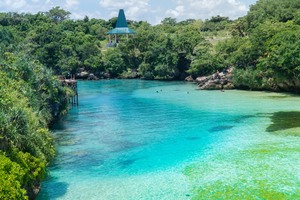 Weekuri Lagoon Sumba turquoise water natural saltwater lagoon surrounded by cliffs